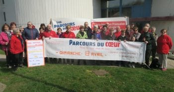Photo du groupe avec les banderoles de la Fédération Française de Cardiologie